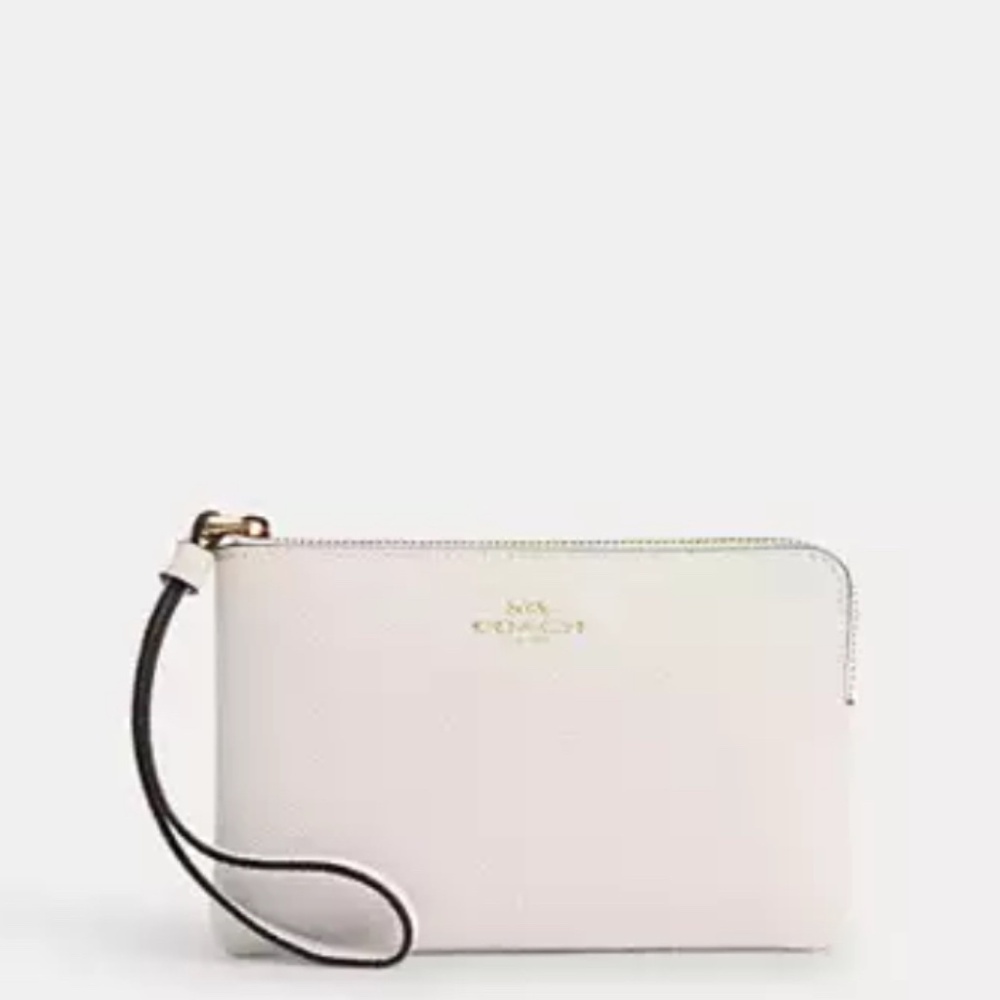 Coach Corner Zip Wristlet In Signature Canvas